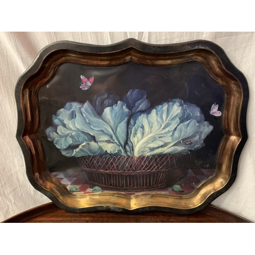 52 - A LARGE WOODEN OVAL BUTLERS TRAY AND A DECORATIVE TIN TRAY WITH VEGETABLE BOWL DESIGN