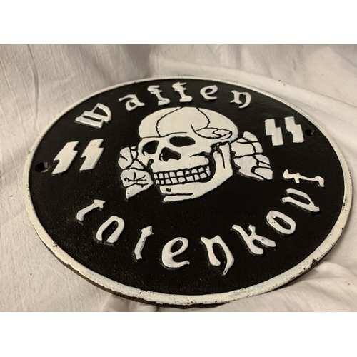 55 - A CAST 'WAFFEN TOTENKOPF' CIRCULAR SIGN D:25CM