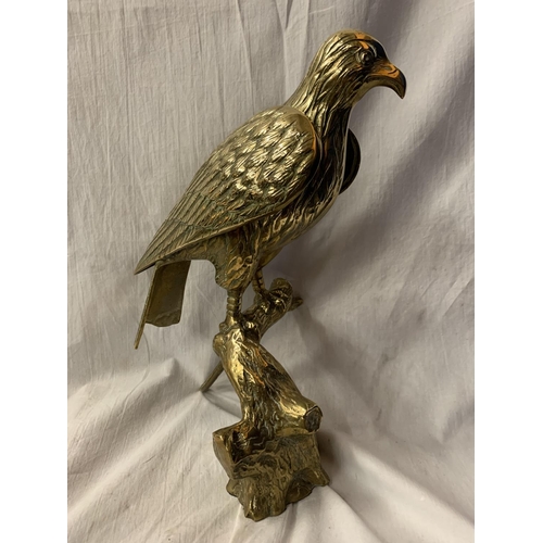 58 - A LARGE BRASS SCULPTURE OF A BIRD OF PREY - 39CM HIGH