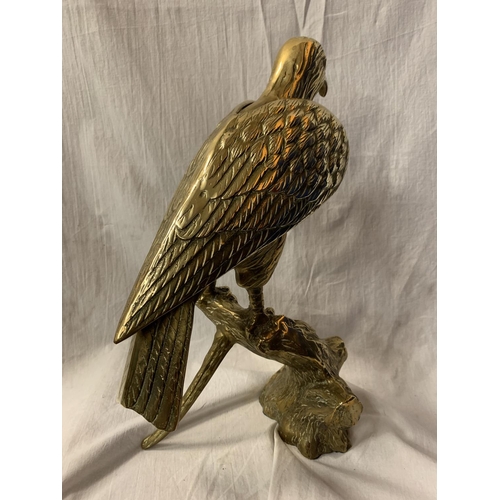 58 - A LARGE BRASS SCULPTURE OF A BIRD OF PREY - 39CM HIGH