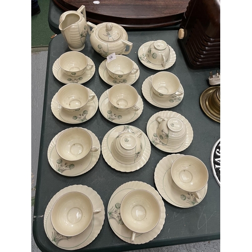 126 - AN ART DECO TEA SET COMPRISING OF CUPS, SAUCERS, MILK JUG AND SUGAR BOWL