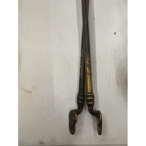 176 - A PAIR OF BRASS FIRE DOGS AND A PAIR OF BRASS FIRE TONGS