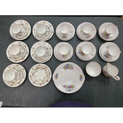 281 - TWO CHINA PART TEA SETS TO INCLUDE TRIOS, MILK JUG, SUGAR BOWL ETC