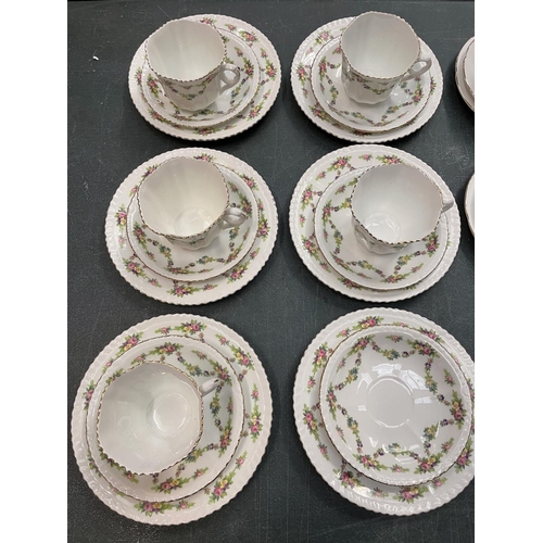 281 - TWO CHINA PART TEA SETS TO INCLUDE TRIOS, MILK JUG, SUGAR BOWL ETC