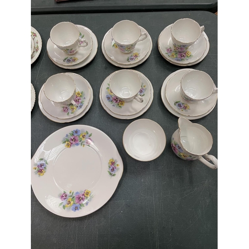 281 - TWO CHINA PART TEA SETS TO INCLUDE TRIOS, MILK JUG, SUGAR BOWL ETC