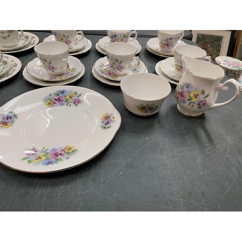 281 - TWO CHINA PART TEA SETS TO INCLUDE TRIOS, MILK JUG, SUGAR BOWL ETC