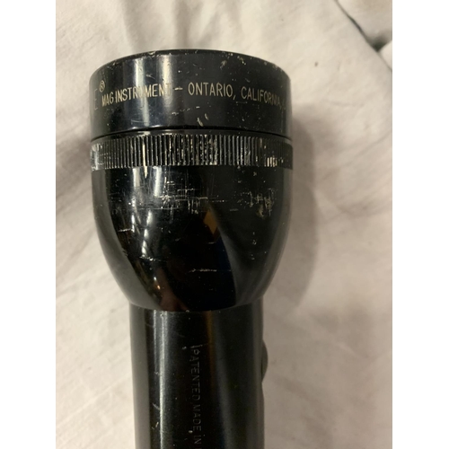 80 - A VINTAGE METAL POLICEMAN'S NIGHT TORCH L: 19 INCHES BELIEVED IN WORKING ORDER BUT NO WARRANTY