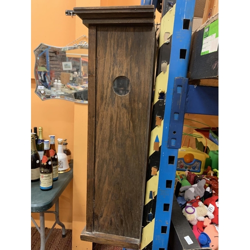 208 - A VINTAGE WOODEN WALL CLOCK WITH BRASS AND GLASS DETAIL IN THE DOOR H:61CM