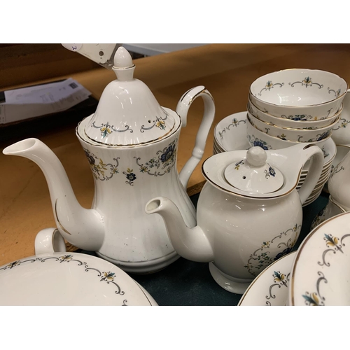 217 - A LARGE QUANTITY OF FINE BONE CHINA TABLE WEAR 'MAYFAIR' TO INCLUDE FOUR TUREENS, A COFFEE JUG, PLAT... 