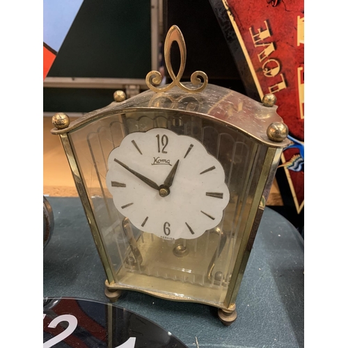 220 - FOUR VARIOUS CLOCKS ONE BEING A VINTAGE KOMA GERMAN MANTEL CLOCK