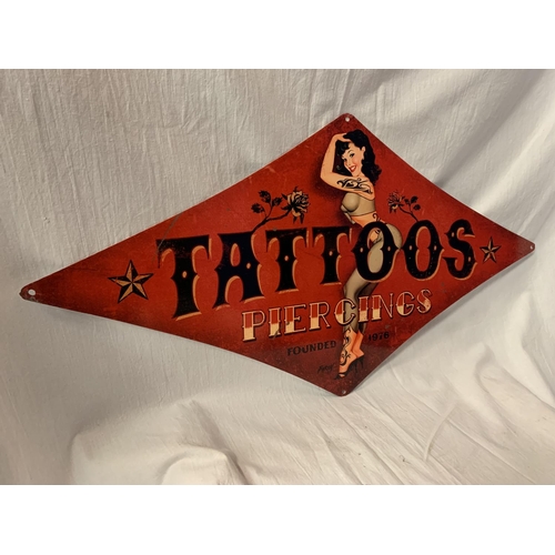 238 - A METAL DIAMOND SHAPED 'TATTOOS' SIGN - 71CM X 36CM (POINT TO POINT)