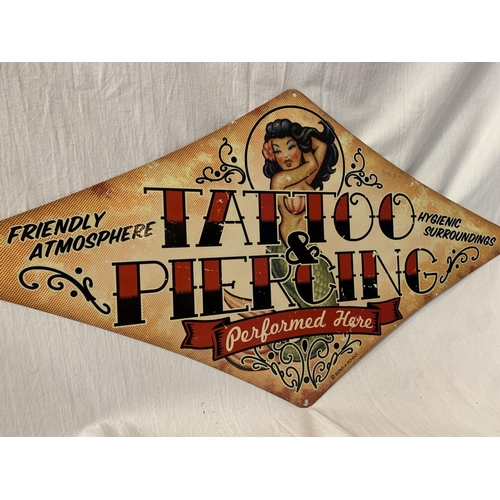 247 - A METAL DIAMOND SHAPED 'TATTOOS' SIGN - 71CM X 36CM (POINT TO POINT)