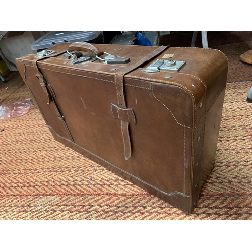 249 - A LARGE VINTAGE BROWN LEATHER SUITCASE WITH CHROME FITTINGS