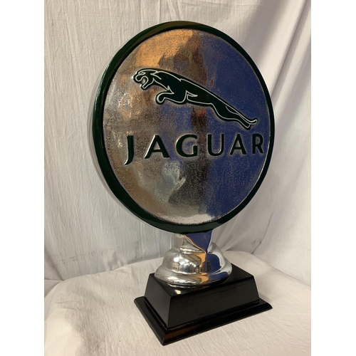 252 - A LARGE 'JAGUAR' CHROME SIGN ON WOODEN BASE