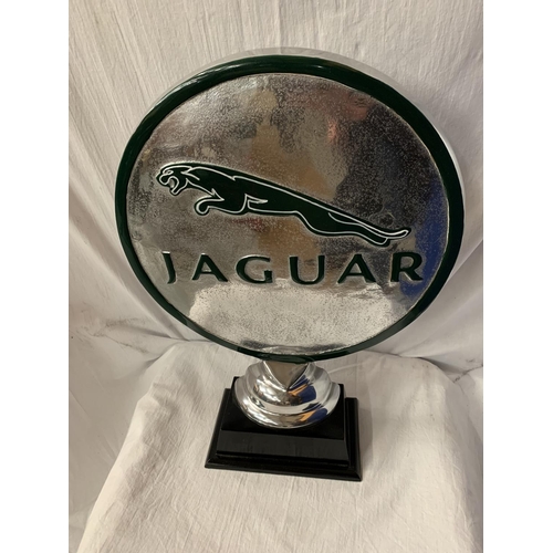 252 - A LARGE 'JAGUAR' CHROME SIGN ON WOODEN BASE