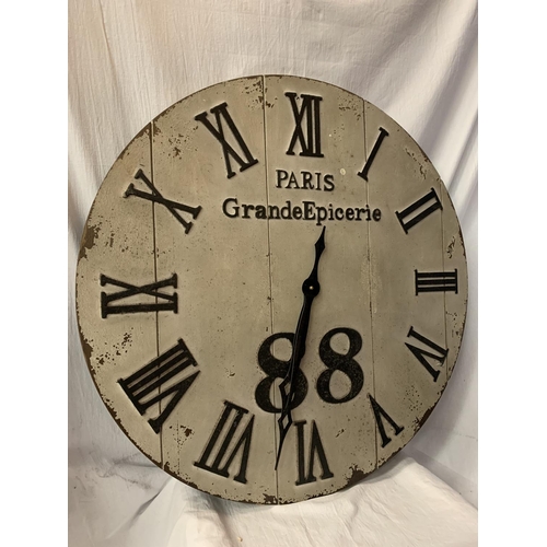 255 - A LARGE CIRCULAR WOODEN 'PARIS' CLOCK DIA:76CM