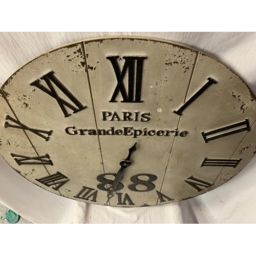 255 - A LARGE CIRCULAR WOODEN 'PARIS' CLOCK DIA:76CM