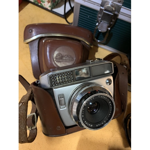 265 - AN ASSORTMENT OF VINTAGE CAMERAS, CASES AND A FLASH ETC