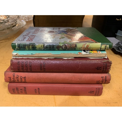 267 - A QUANTITY OF ENID BLYTON BOOKS AND A LARGE FAMILY BIBLE