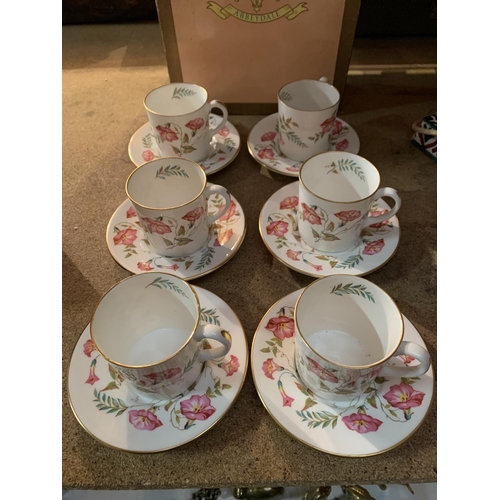 293 - A SET OF SIX ABBEYDALE FLORAL DECORATED COFFEE CUPS AND SAUCERS WITH ORIGINAL BOX