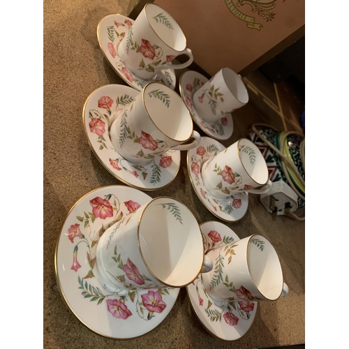 293 - A SET OF SIX ABBEYDALE FLORAL DECORATED COFFEE CUPS AND SAUCERS WITH ORIGINAL BOX