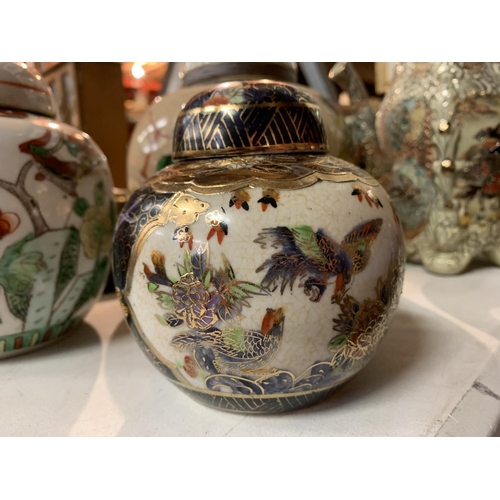 300 - AN ASSORTMENT OF CERAMICS TO INCLUDE GINGER JARS, ORIENTAL COFFEE POT AND STORAGE JAR