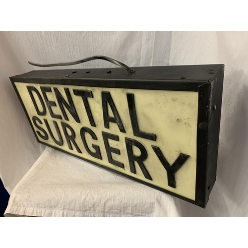 53 - AN ILLUMINATED 'DENTAL SURGERY' SIGN
