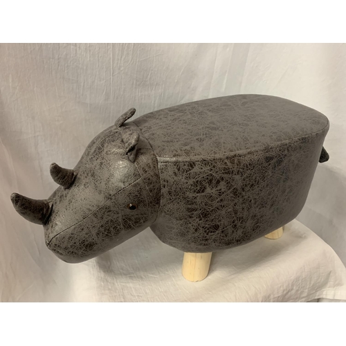 55 - A CHILD'S FAUX FUR FOOTSTOOL IN THE FORM OF A RHINO