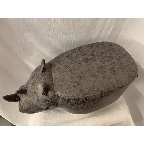 55 - A CHILD'S FAUX FUR FOOTSTOOL IN THE FORM OF A RHINO
