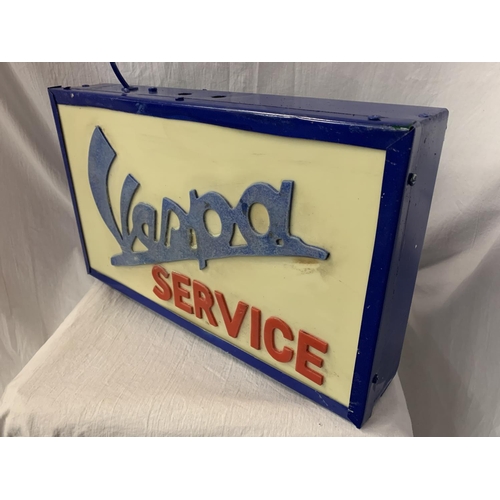 58 - AN ILLUMINATED 'VESPA' SIGN