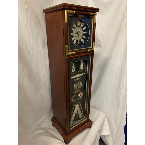60 - A TALL NAUTICAL CLOCK INCORPORATING FIVE INTERNAL SHELVES AND A COMPASS H: 80CM