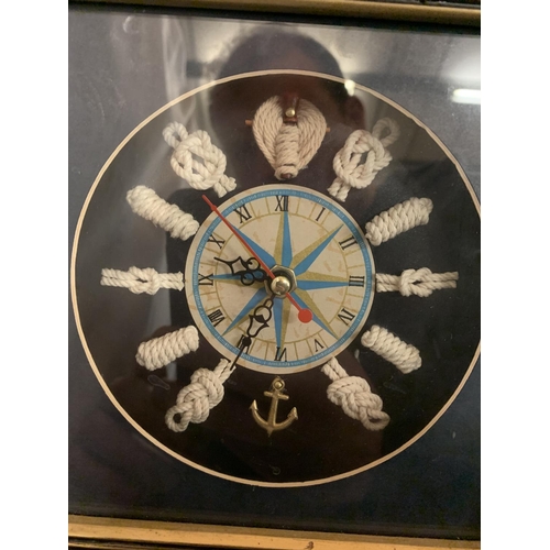 60 - A TALL NAUTICAL CLOCK INCORPORATING FIVE INTERNAL SHELVES AND A COMPASS H: 80CM