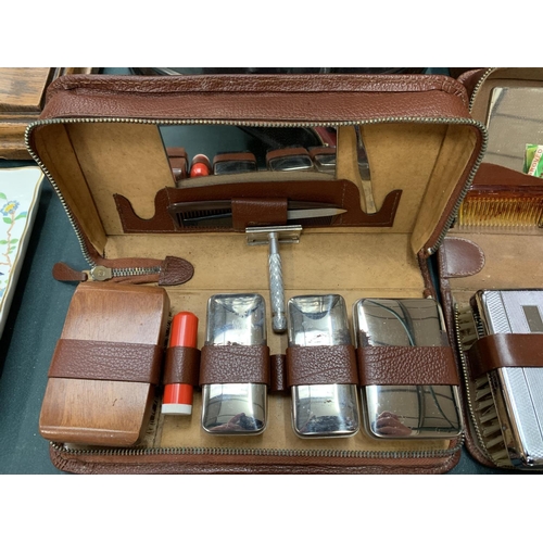 68 - THREE VINTAGE CASED GENTLEMAN'S GROOMING KITS