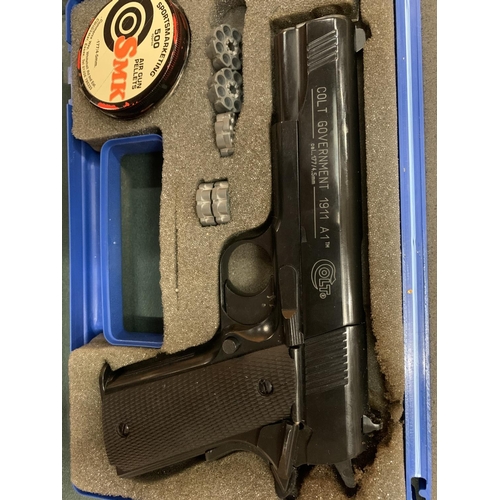 73 - A COLT GOVERNMENT 1911 A1 AIR GUN WITH PELLETS INCLUDED
