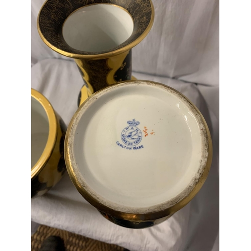 79 - A GROUP OF DECORATIVE CARLTON WARE, A PLANTER AND A PAIR OF VASES H: 32.5CM