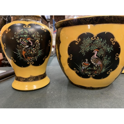 79 - A GROUP OF DECORATIVE CARLTON WARE, A PLANTER AND A PAIR OF VASES H: 32.5CM
