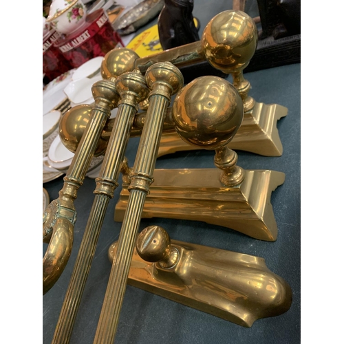 88 - A BRASS COMPANION SET AND FIREDOGS TO INCLUDE A SHOVEL ETC