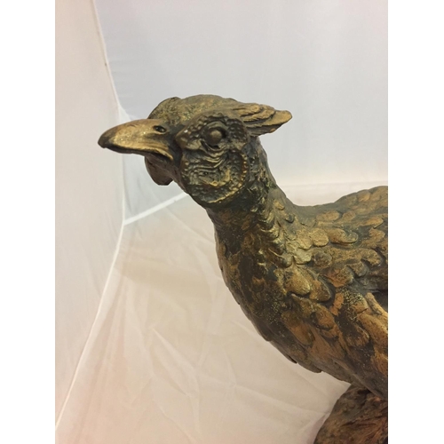 163 - A LARGE RESIN FIGURE OF A PHEASANT - H:35CM L:58CM