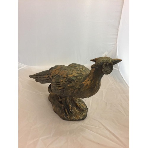 163 - A LARGE RESIN FIGURE OF A PHEASANT - H:35CM L:58CM
