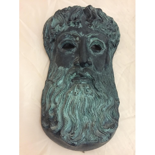165 - A HARDWOOD CARVED TRIBAL MASK AND A GREEK CERAMIC MASK OF ZEUS