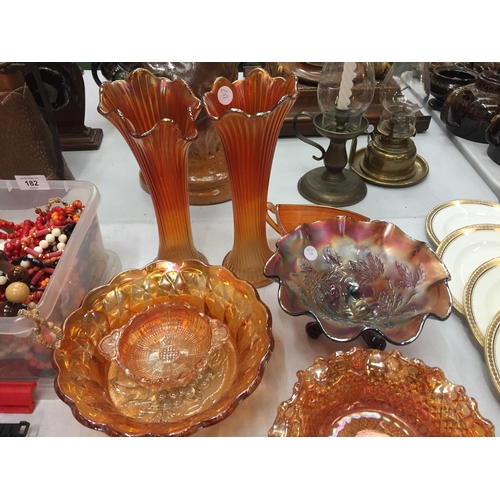 180 - AN ASSORTMENT OF CARNIVAL GLASSWARE TO INCLUDE BOWLS, VASES ETC
