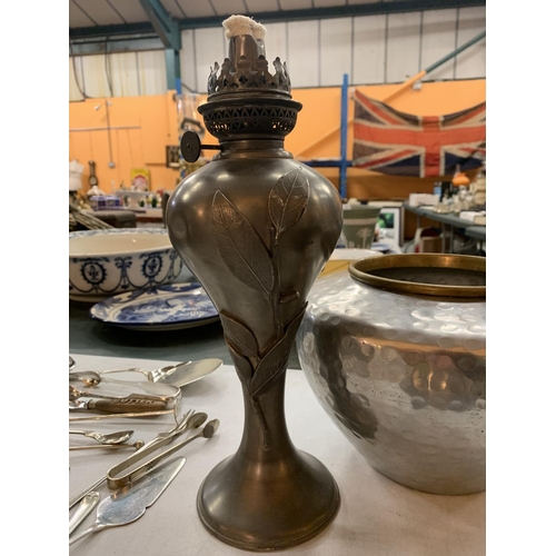 157 - A SILVER PLATED RECTANGULAR SERVING TRAY, A PEWTER OIL LAMP WITH EMBOSSED LEAF DECORATION  BY JEAN G... 