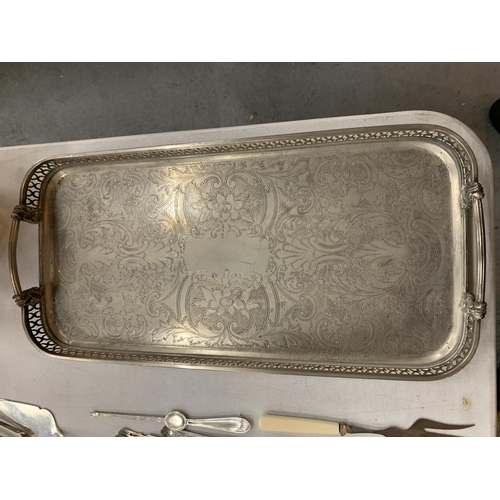 157 - A SILVER PLATED RECTANGULAR SERVING TRAY, A PEWTER OIL LAMP WITH EMBOSSED LEAF DECORATION  BY JEAN G... 