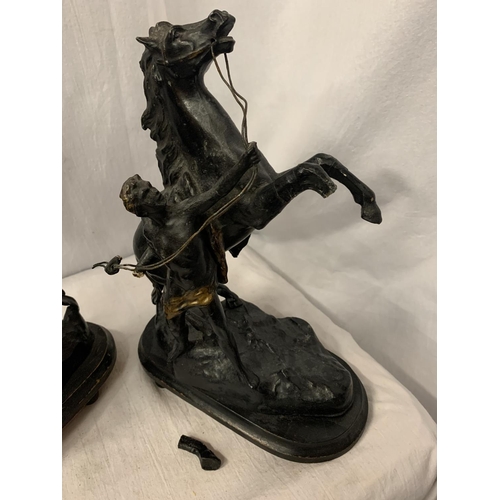 159A - A PAIR OF SPELTER FIGURES OF MARLY HORSES REARING, WITH HANDLER  ON WOODEN BASES A/F