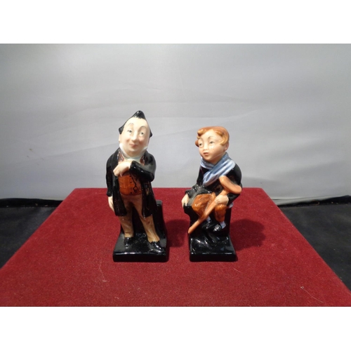 717 - EIGHT ROYAL DOULTON DICKENS FIGURES