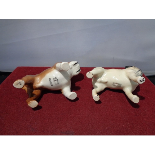 719 - SIX BESWICK DOGS TO INCLUDE PUG, WESTIE, BOXER ETC