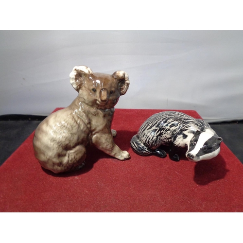 720 - FIVE BESWICK ITEMS TO INCLUDE POODLES, KOALA BEAR, LABRADOR AND A BADGER