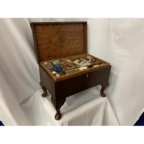 13 - A VINTAGE MAHOGANY SEWING BOX TO INCLUDE THE CONTENTS OF A LARGE QUANTITY OF SEWING RELATED ITEMS H:... 