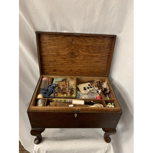 13 - A VINTAGE MAHOGANY SEWING BOX TO INCLUDE THE CONTENTS OF A LARGE QUANTITY OF SEWING RELATED ITEMS H:... 