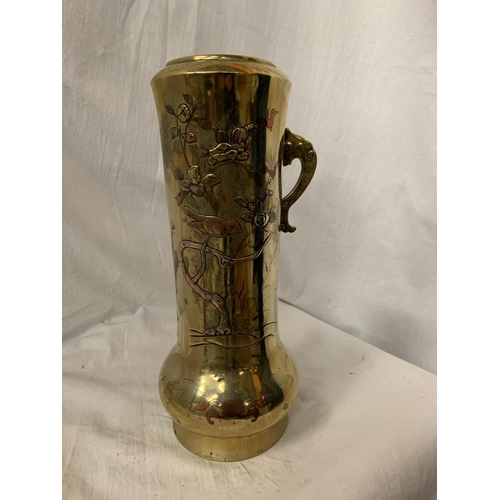 16 - A DECORATIVE BRASS VESSEL WITH EMBOSSED COPPER AVIAN DESIGN H: 36CM